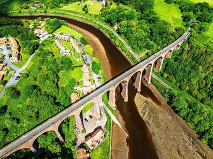 Larpool Viaduct over River Esk and Esk Valley Viaduct from a drone, Whitby, North Yorkshire,