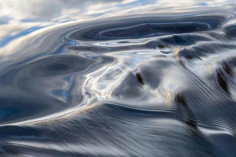 Waves in a stream, abstract, Norrbotten, Lapland, Sweden, August 2022