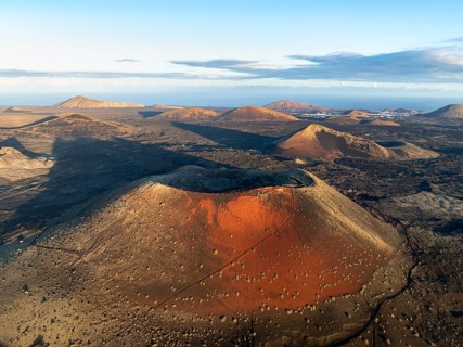 Picturesque volcanic landscape with volcanic craters and lava fields in morning light, Caldera