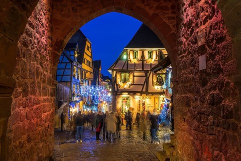 Colour-illuminated and Christmassy decorated half-timbered houses, blue hour, Christmas market,