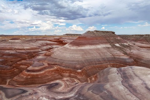 A breathtaking aerial photograph showcasing the unique and textured geological formations near