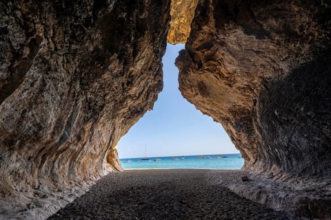 Rock cave on the beach at Cala Luna, Golfo di Orosei, Baunei, Sardinia, Italy