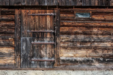 Old wooden door on an old wooden barn, Oberallgäu, Allgäu Alps, Allgäu, Bavaria, Germany