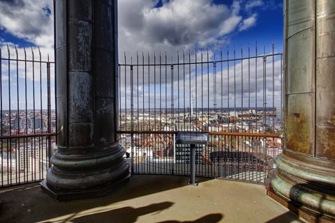 View from the viewing platform of Hamburger Michels over the urban landscape, fenced and under a