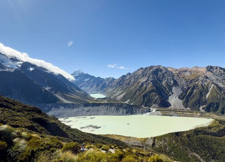 A breathtaking view of Mount Cook during autumn, showcasing its majestic peaks and serene glacial