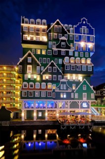 ZAANDAM, NETHERLANDS, MAY 21, 2018: Inntel Hotel in Zaandam illuminated at night. Design of