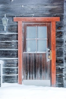 Europe, Finland, Lapland, frozen wooden house, ice window