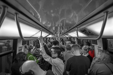 Full metro at rush hour, black and white, Paris, France