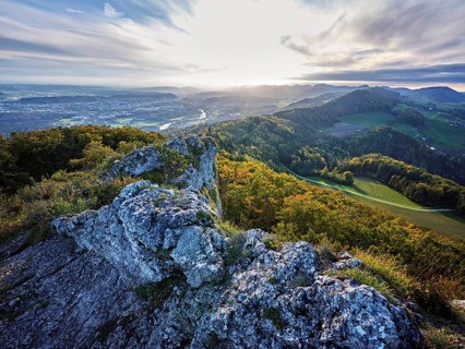 View from the Gisliflue of an autumnal forest with the Jura foothills behind, Talheim, Canton,