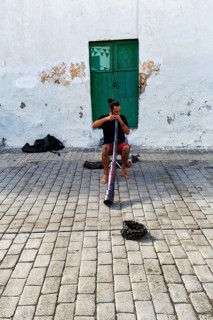 Street musician playing didgeridoo, old town, Teguise, Lanzarote, Spain