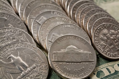 Close-up of rows of US quarter dollars, five cents and ten cents coins, Studio Composition, Quebec,
