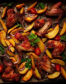 Fried chicken wings, with potatoes, and spices, homemade, fast food, no people