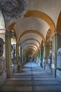 Arcade with tombs at the Monumental Cemetery, Cimitero monumentale di Staglieno), Genoa, Italy