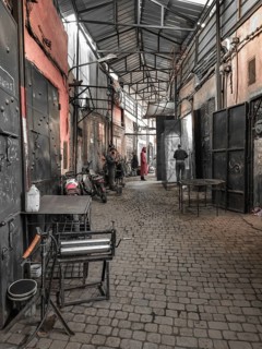 Shops in a narrow, covered alley in the Medina, atmospheric atmosphere, Morocco
