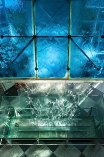 Water flows over glass surface