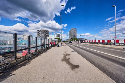 Car bridge and footbridge, metal railings, glass elements, sidewalk, road, lanes, lantern, road