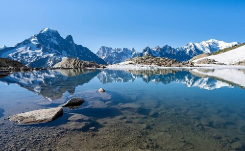 Picturesque mountain landscape, reflection in Lac Blanc, mountain peaks, Aiguille Verte, Grandes