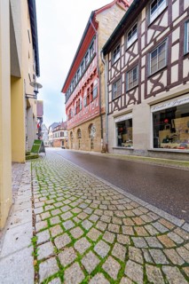 Cobblestone alley lined with half-timbered houses in the old town, Großbottwar, Ludwigsburg