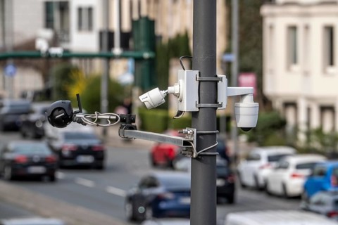 Flir and Vivotek video cameras at a large, busy traffic light intersection, Alfredstraße, B224 and