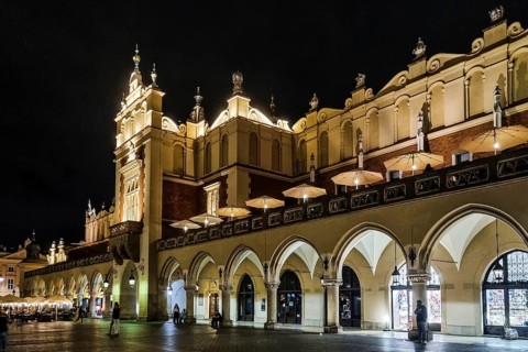 Night view of Rynek with Cloth Hall, from 13th century, Main Market Square, city landmark, Krakow,