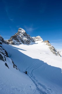Porta d'Es-cha in winter, view of mountain peak Piz Kesch and glacier Vadret da Porchabella, high