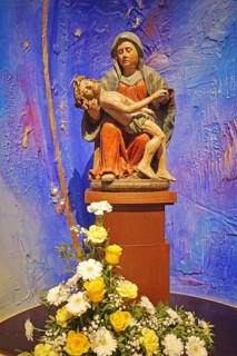 Pieta with bouquet of flowers, Mother of God, death, Jesus, carrying in arms, blue, modern art,
