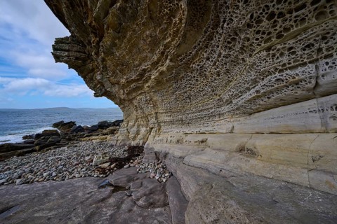 Impressive rocky coastline with distinctive signs of erosion and ocean views, Elgol Beach, Elgol,