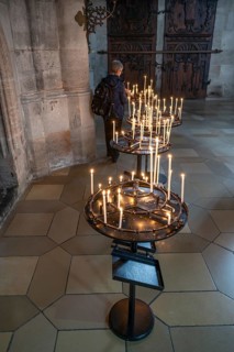 Sacrificial candles in the late Gothic hall church of St George, Dinkelsbühl, Bavaria, Germany