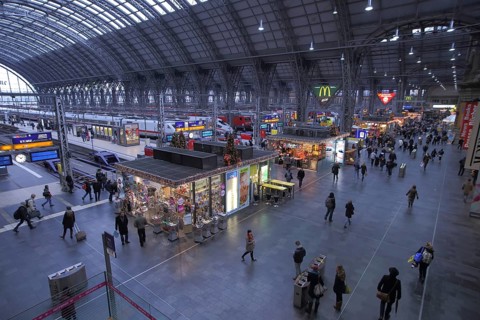 Interior view of the station concourse from the main train station, train, kiosk, symbol of