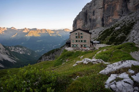 Rifugio Maria E Alberto Ai Brentai mountain hut and rocky peak, Brenta, Trentino, Italy