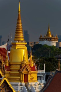 The chedi from Wat Tri Thotsathep Worawihan, behind it the Golden Mount, Bangkok, Thailand