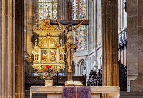 St. Dionys Town Church. interior view. Crucifixion scene on the high altar created in 1604.