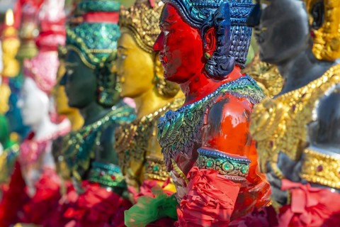 Thai style angel, graceful figures, in traditional golden clothing with ornate headdress, Thai