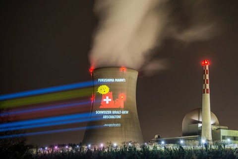Protest action broadcast by the anti-nuclear organization, projection, night view, 05-03-2026,