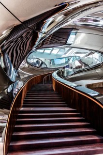 Spectacular double spiral staircase from ground floor to roof terrace, offering breathtaking views