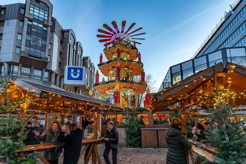 Christmas pyramid at Dortmund's Christmas market at dusk, Dortmund, North Rhine-Westphalia, Germany