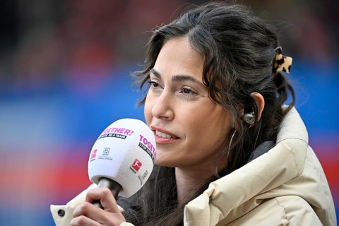 Interview microphone logo in hand by DAZN presenter reporter Ann-Sophie Kimmel portrait action day
