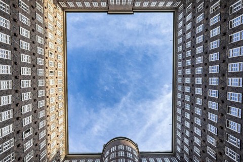 View of the sky in the courtyard of the Chilehaus in the Kontorhausviertel, Hamburg, Germany