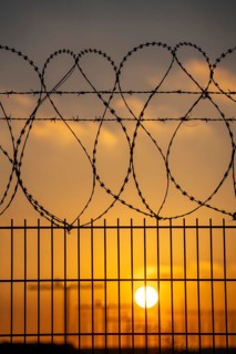 Symbolic image security at the airport, outer fence at Düsseldorf International Airport, steel wire