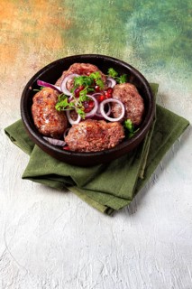 Fried apkhazura, cutlet in a fat grid, spicy, Georgian dish, fried on ketsi, homemade, no people