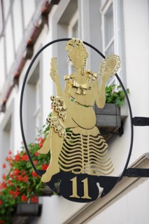 Nose sign with house number, Lemgo, North Rhine-Westphalia, Germany