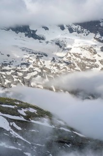 Mountain landscape with clouds and glacier Schlegeiskees, Berliner Höhenweg, Zillertal Alps, Tyrol,