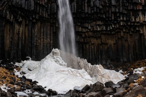 Waterfall, basalt columns, snow, winter, Svartifoss, Iceland, Scandinavia