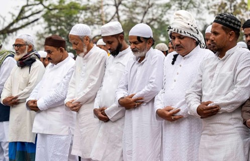 Muslims attend to Eid al-Fitr prayer at Eidgah, on March 21, 2026 in Guwahati, India. Muslims make