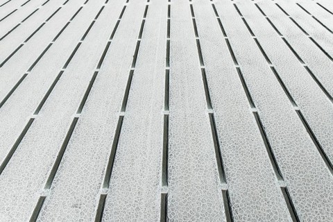 Close-up view of geometric salt formations at Salinas Grandes in Salta, Argentina. The surface