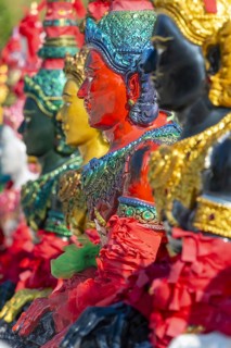 Thai style angel, graceful figures, in traditional golden clothing with ornate headdress, Thai