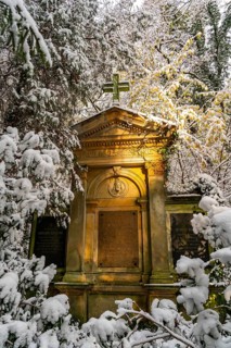 Grave mausoleum in the snow, south-west churchyard, historic cemetery in Stahnsdorf,