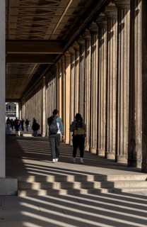 Light and shadow on the colonnade at the museums on Berlin's Museum Island, Germany