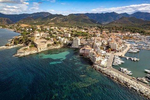 Marina and old town of Saint-Florent seen from above, Corsica, France