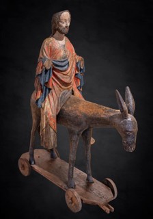 Palm tree donkey, wooden figure from around 1380, painted on a dark background, Hohenzollerisches